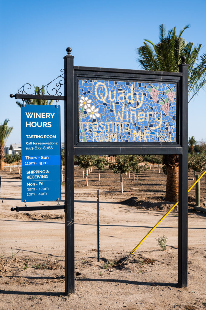 The sign at the entrance of Quady Winery in Madera, california