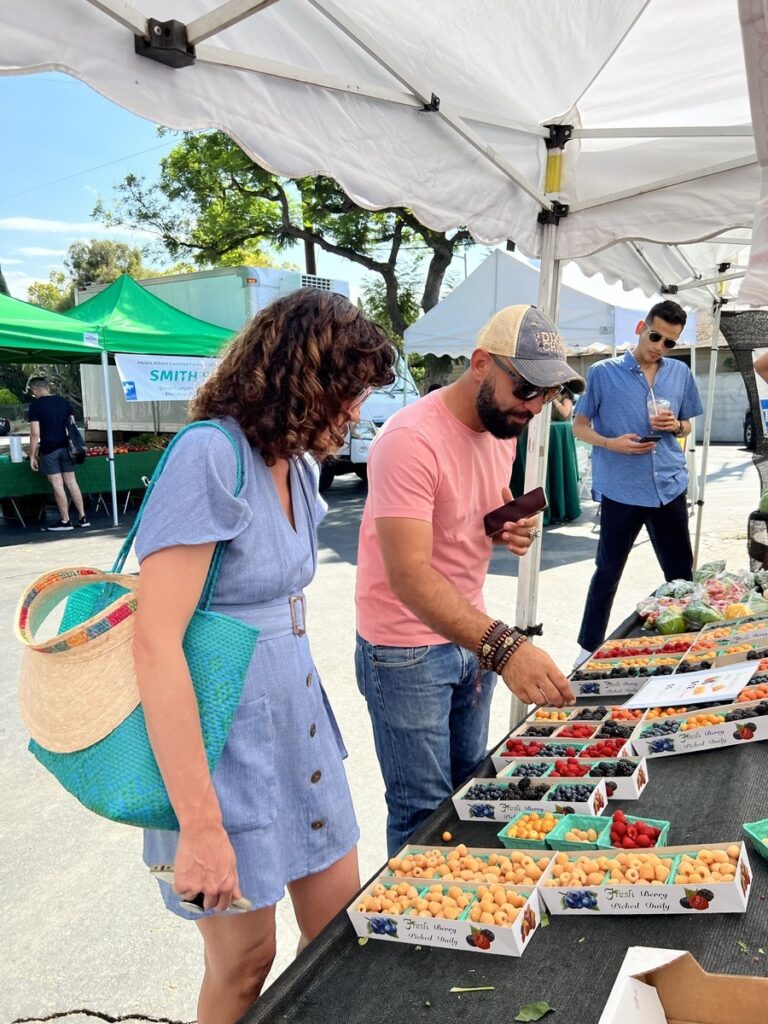 woman shopping at farmers market