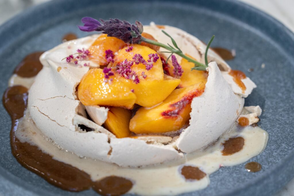 Peach Pavlova at Canon, a farm-to-fork restaurant in Sacramento