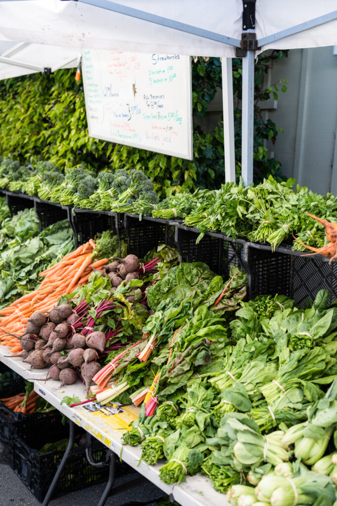 vegetables for sale at the booth at Santa Cruz Farmers Market
