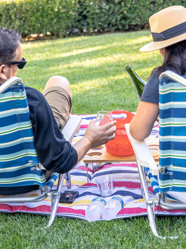 a couple pouring wine at San Joaquin Wine Co. 