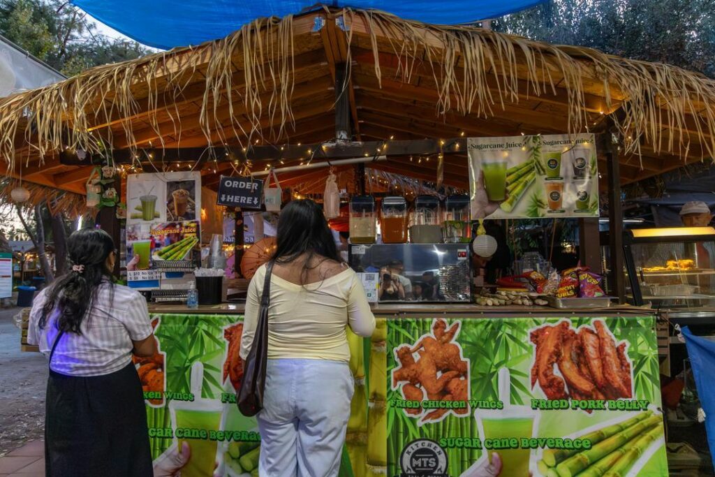 two women ordering at Lotus Pond Sanger